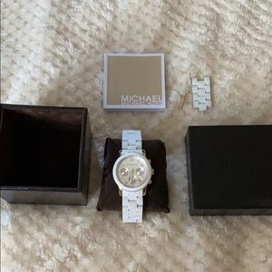 Michael Kors women’s white/gold wristwatch ⌚️